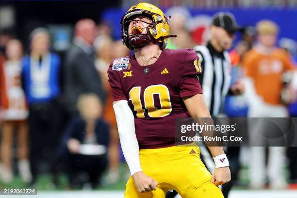 Sam Leavitt of the Arizona State Sun Devils reacts after a score during the fourth quarter against the Texas Longhorns in the Chick-fil-A Peach Bowl...