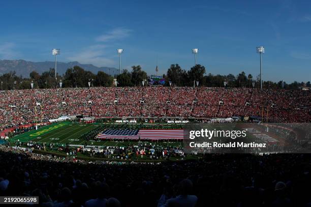 General view of the inside of the stadium during the national anthem prior to the game between the Ohio State Buckeyes and the Oregon Ducks during...