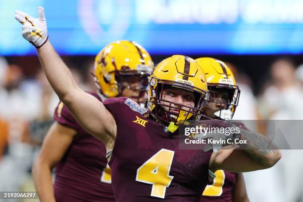 Cam Skattebo of the Arizona State Sun Devils reacts during overtime against the Texas Longhorns in the Chick-fil-A Peach Bowl at Mercedes-Benz...