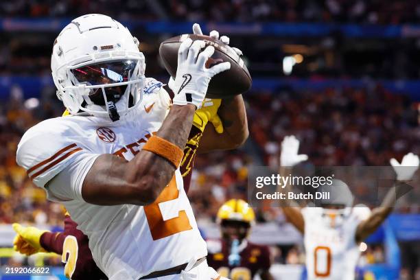 Matthew Golden of the Texas Longhorns catches a pass for a 2-point conversion during the second overtime against the Arizona State Sun Devils in the...