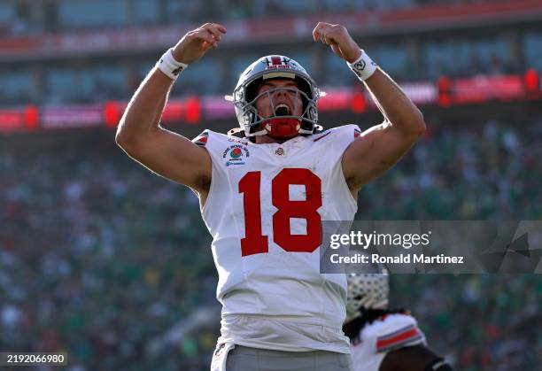 Will Howard of the Ohio State Buckeyes celebrates a touchdown during the first quarter against the Oregon Ducks during the Rose Bowl Game Presented...