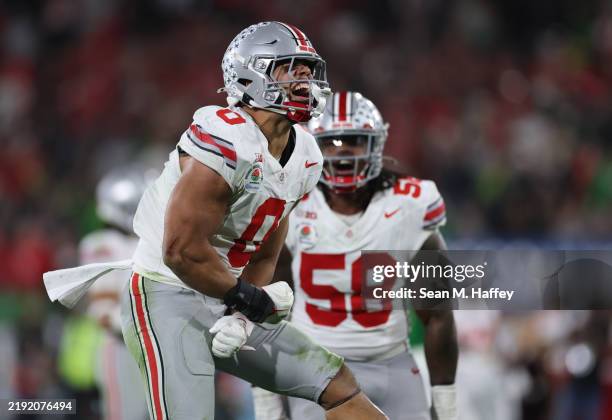 Cody Simon of the Ohio State Buckeyes reacts after a sack during the fourth quarter against the Oregon Ducks during the Rose Bowl Game Presented by...