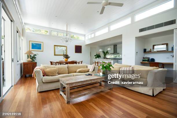 comfortable open plan interior, modern one-story house - open plan stock pictures, royalty-free photos & images