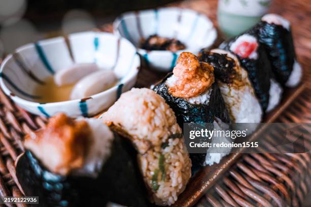onigiri - japanese rice balls - rice ball stock pictures, royalty-free photos & images