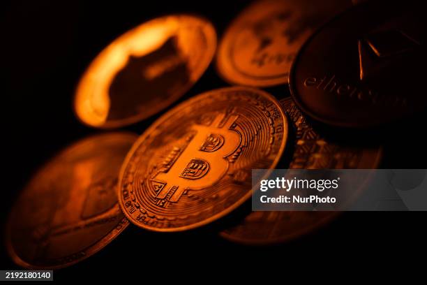 Representation of cryptocurrencies are seen in this illustration photo taken in Krakow, Poland on January 6, 2025.