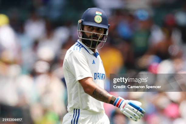 Virat Kohli of India looks dejected while leaving the field after being dismissed by Scott Boland of Australia during day one of the Fifth Men's Test...