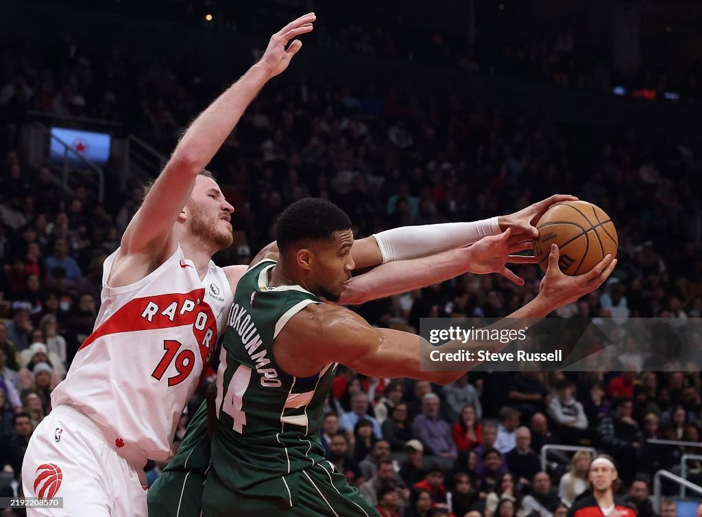 Toronto Raptors Centre TORONTO, ON- JANUARY 6 - Toronto Raptors center Jakob Poeltl tries to ...