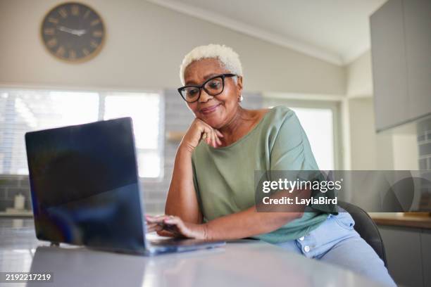 engaged senior online - 65 69 years stock pictures, royalty-free photos & images