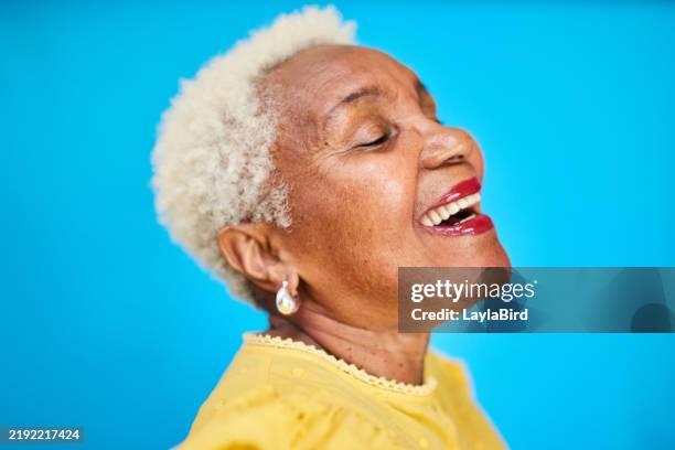 radiant joy: senior woman laughing - drop earring stock pictures, royalty-free photos & images