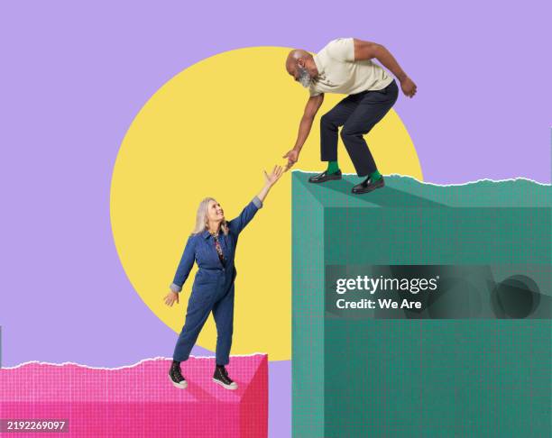 man giving woman a helping hand - montage photos et images de collection