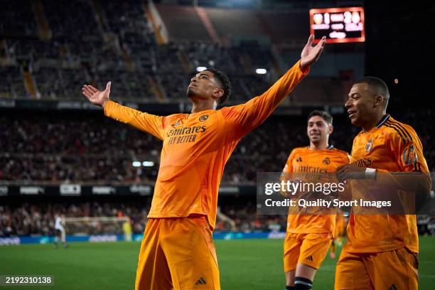 Jude Bellingham of Real Madrid celebrates after scoring their side's second goal during the LaLiga match between Valencia CF and Real Madrid CF at...