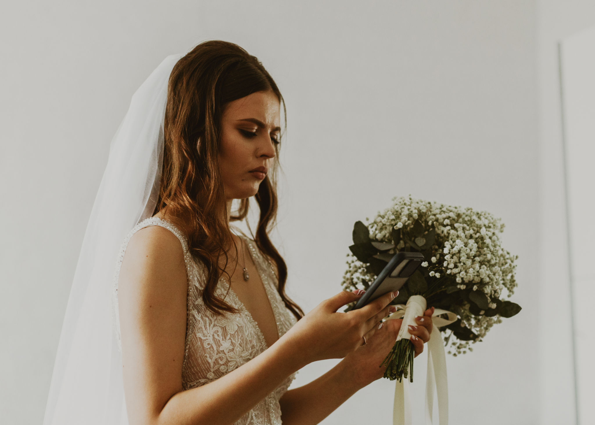 bride looking at photos