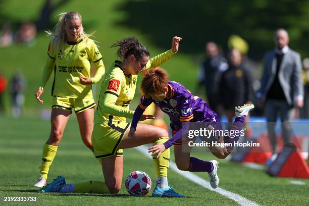 Miku Sunaga of the Glory is tackled by Zoe McMeeken of the Phoenix during the round 10 A-League Women's match between Wellington Phoenix and Perth...