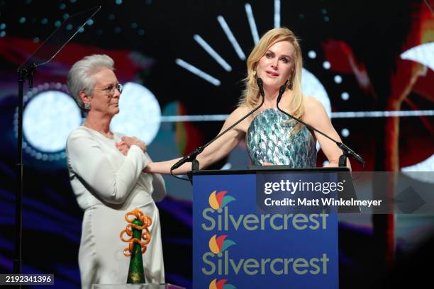 Nicole Kidman accepts the International Star Award from Jamie Lee Curtis onstage during the 36th Annual Palm Springs International Film Awards at...