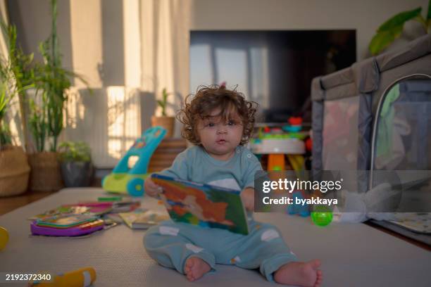 curious baby exploring her world - worlds smallest baby stock pictures, royalty-free photos & images