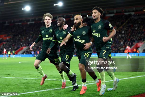 Bryan Mbeumo of Brentford celebrates scoring his sides second goal with team mates Mads Roerslev, Yoane Wissa and Kevin Schade of Brentford during...