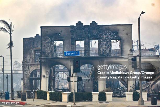January 08: A burned building on Sunset Boulevard during the Palisades Fire on Wednesday, January 8 in Pacific Palisades, CA.
