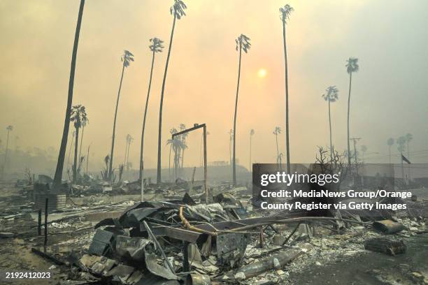 January 08: A mobile home park is destroyed along Pacific Coast Highway during the Palisades Fire on Wednesday, January 8 in Pacific Palisades, CA.