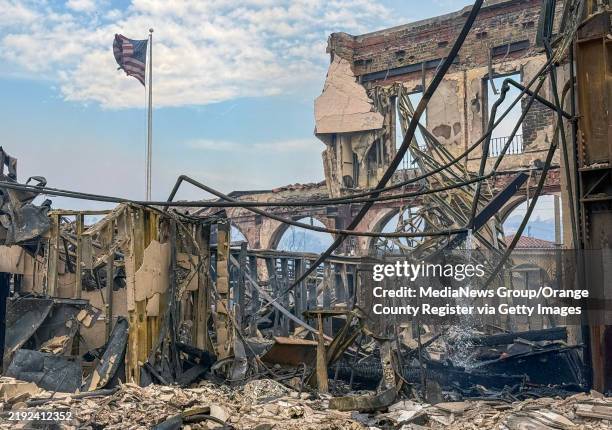 January 08: A burned building on Sunset Boulevard during the Palisades Fire on Wednesday, January 8 in Pacific Palisades, CA.