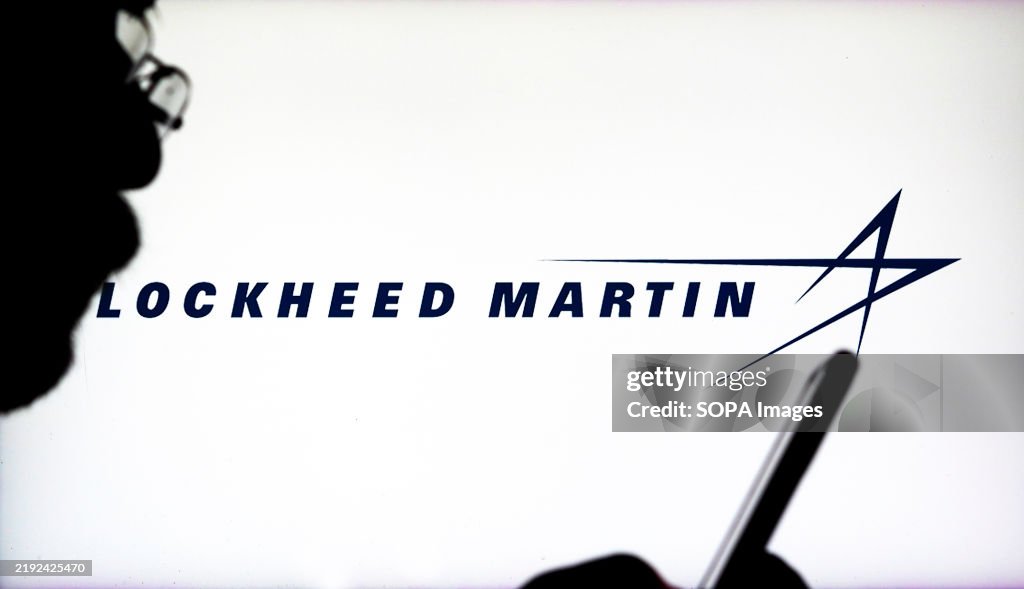 Lockheed Martin Check In this photo illustration, a Lockheed Martin Corporation logo seen ...