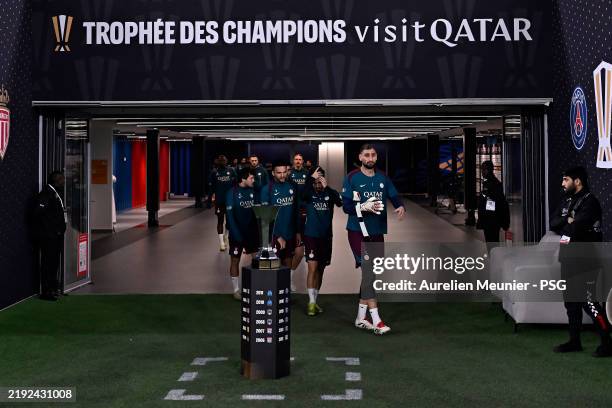 Gianluigi Donnarumma, Vitinha and Goncalo Ramos walk out of the players tunnel before a Paris Saint-Germain training session as part of the Visit...
