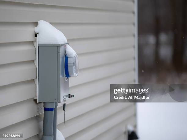 electricity power meter in winter - fahrenheit stock pictures, royalty-free photos & images