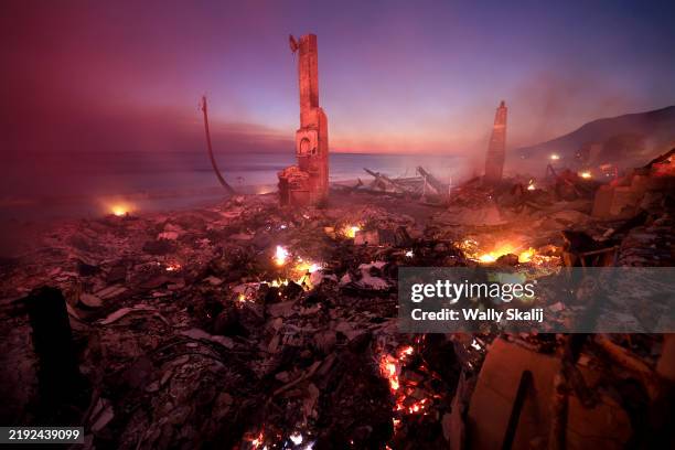 Malibu, California January 8, 2025-A house burns along PCH as the Palisades Fire burns in Malibu Wednesday.