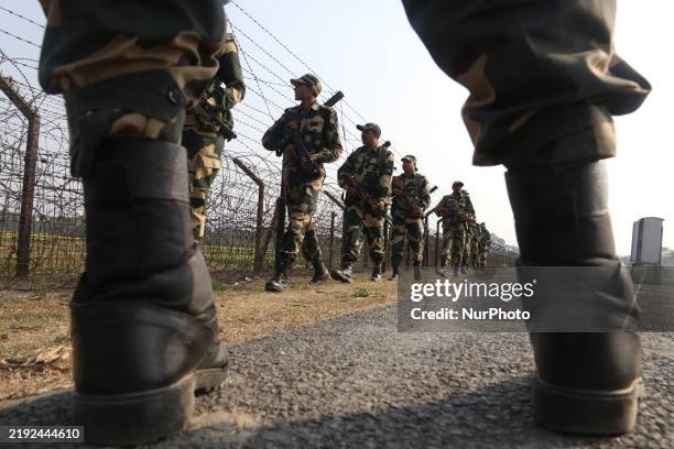 Indian Border Security Force soldiers patrol at the India-Bangladesh Border on the outskirts of Kolkata, India, on January 9, 2025. At the...