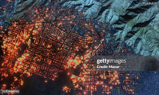 Sequence image 06. Maxar shortwave infrared closer satellite image of burning buildings in Altadena, California. Please use: Satellite image 2025...