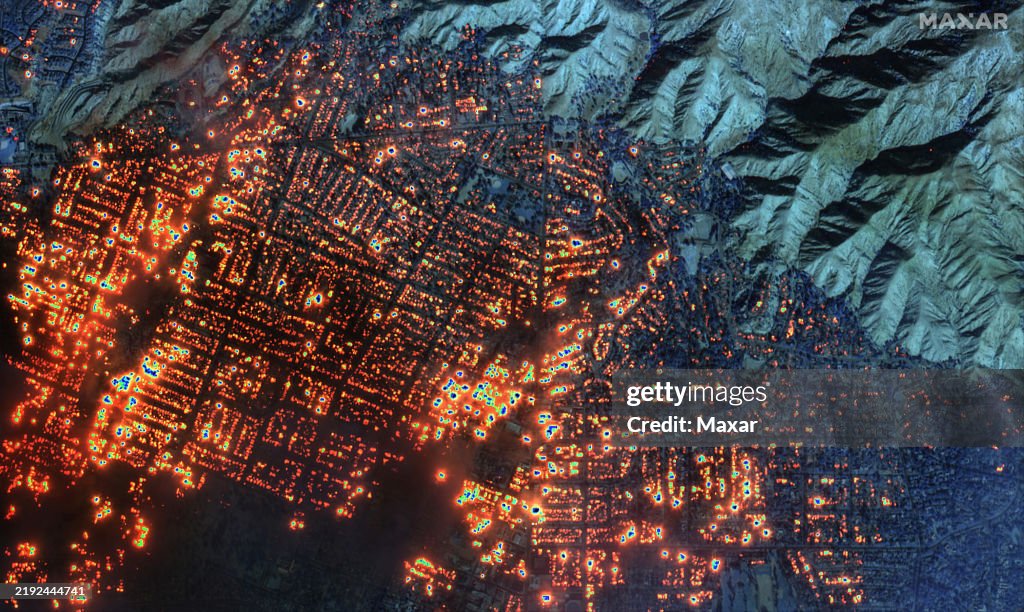ALTADENA FIRE, LOS ANGELES, CALIFORNIA -- JANUARY 8, 2025: Sequence image 06. Maxar shortwave infrared closer satellite image of burning buildings in Altadena, California. Please use: Satellite image (c) 2025 Maxar Technologies.