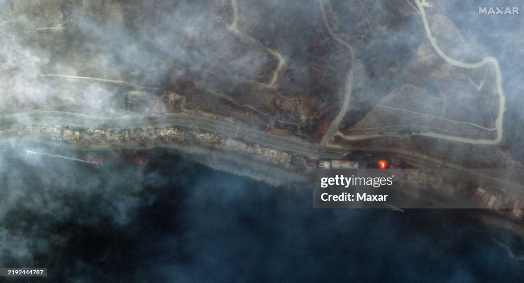 PALISADES FIRE, LOS ANGELES, CALIFORNIA -- JANUARY 8,, 2025: Sequence image 08. Maxar AFTER satellite image of the homes and businesses along PCH, Tuna Canyon, Palisades, California. Please use: Satellite image (c) 2025 Maxar Technologies.