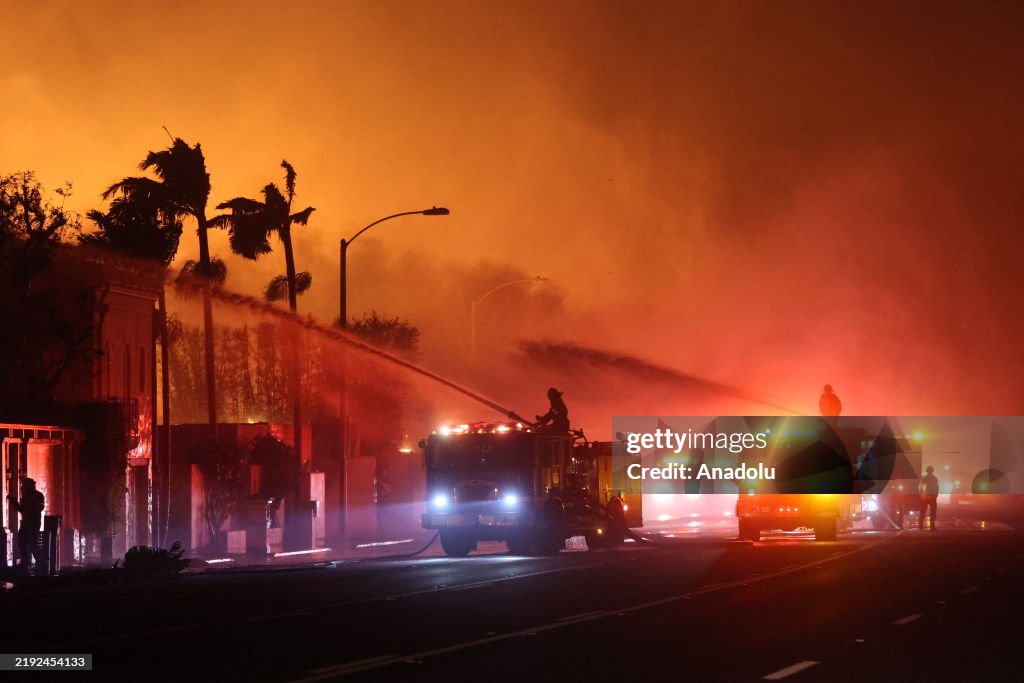 Firefighters continue battling Palisades fire in Los Angeles as flames rage out of control