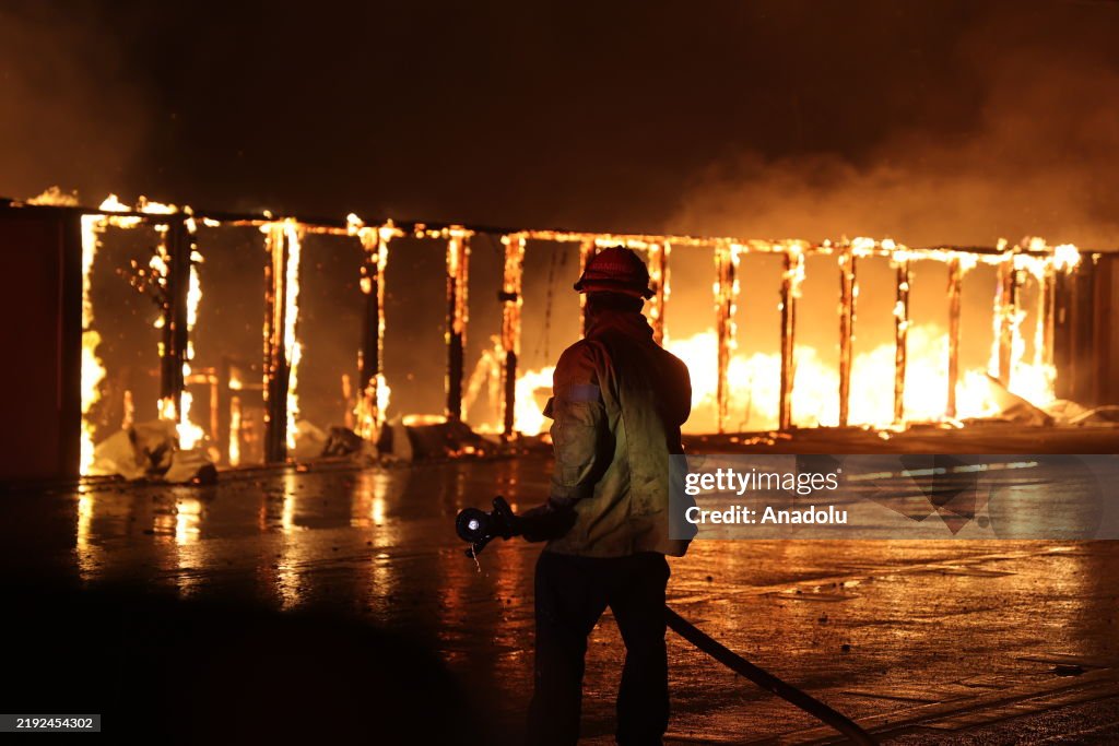 Firefighters continue battling Palisades fire in Los Angeles as flames rage out of control