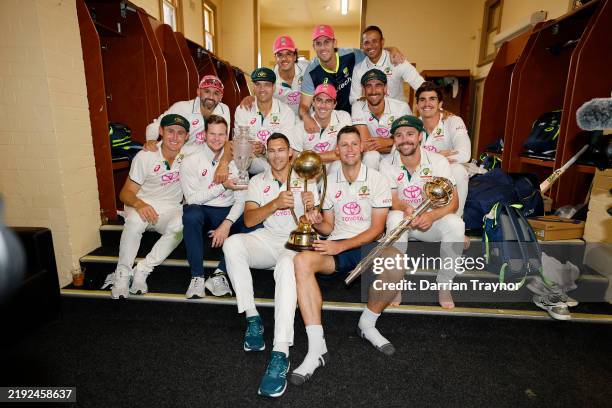 The Australian team pose for a photo in the dressing rooms after winning the fifth test on day three of the Fifth Men's Test Match in the series...
