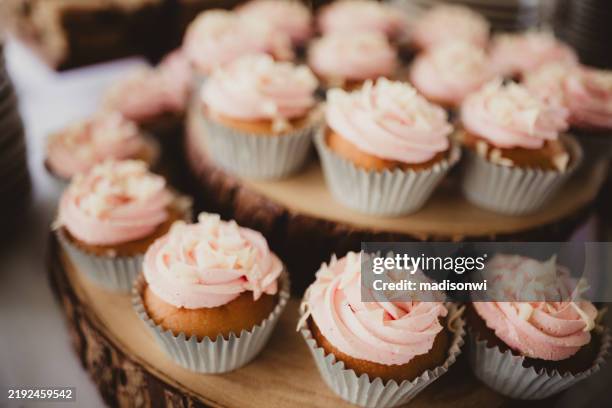 close up of strawberry vanilla cupcakes with white chocolate - cupcake stock pictures, royalty-free photos & images