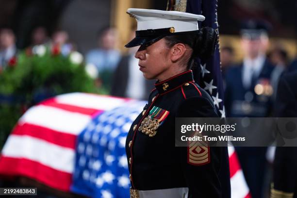Jimmy Usmc A Marine changes guard as the remains of the late Jimmy Cater, 39th ...