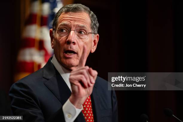 Sen. John Barrasso gestures while speaking during a press conference discussing the Laken Riley Act at the US Capitol on January 9, 2025 in...