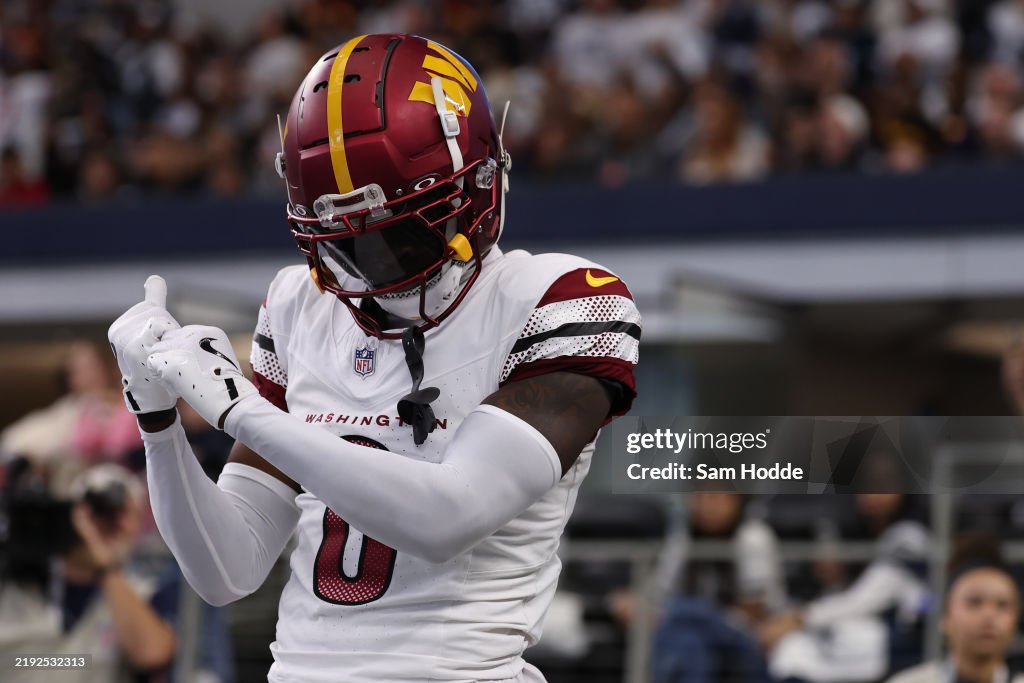 Mike Commanders Mike Sainristil of the Washington Commanders reacts after breaking up ...