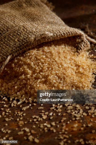 raw sugar - brown sugar sack stock pictures, royalty-free photos & images