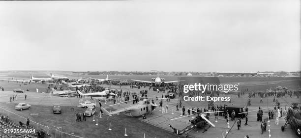 High angle view of visitors and aircraft at the Farnborough Air Show, Hampshire, September 6th 1962.