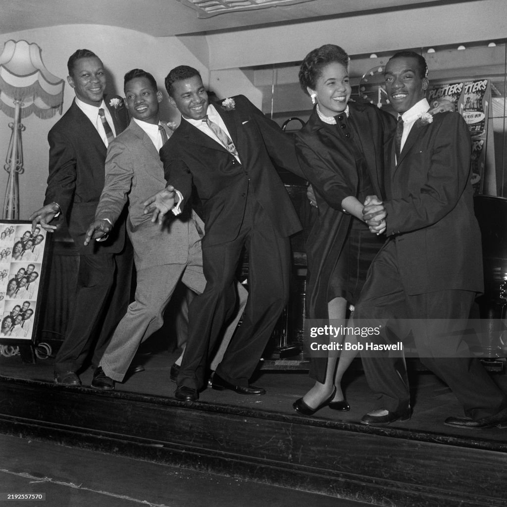 Apu Robi Pop group The Platters smile while posing in a row, from left: Tony ...