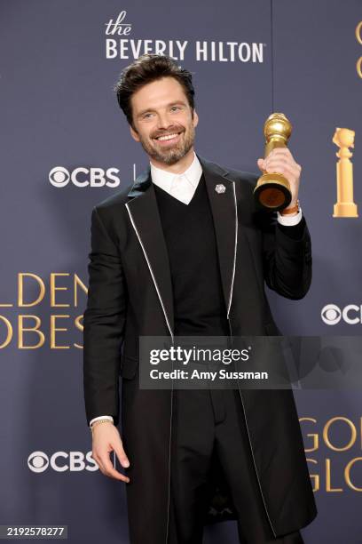 Sebastian Stan, winner of the Best Performance by a Male Actor in a Motion Picture - Musical or Comedy award for “A Different Man,” poses in the...