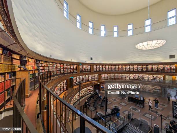 In Stockholm, Sweden, on September 29 the Stockholm Public Library, a renowned architectural landmark, features a spacious circular hall with...