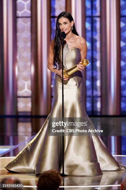 Demi Moore accepts the Best Performance by an Actress in a Motion Picture — Musical or Comedy award for "The Substance" onstage during the 82nd...