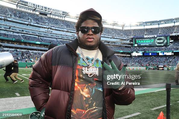 Cash Cobain Rapper Rapper Cash Cobain appears on the sidelines when he attends the Miami ...