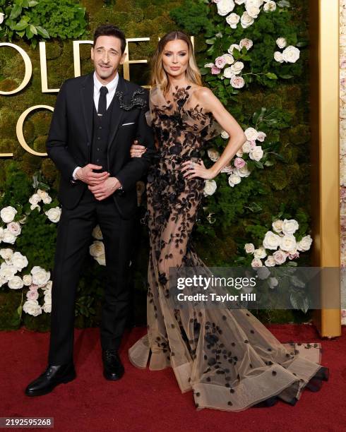 Adrien Brody and Georgina Chapman attend the 2025 Golden Globe Awards at The Beverly Hilton on January 05, 2025 in Beverly Hills, California.