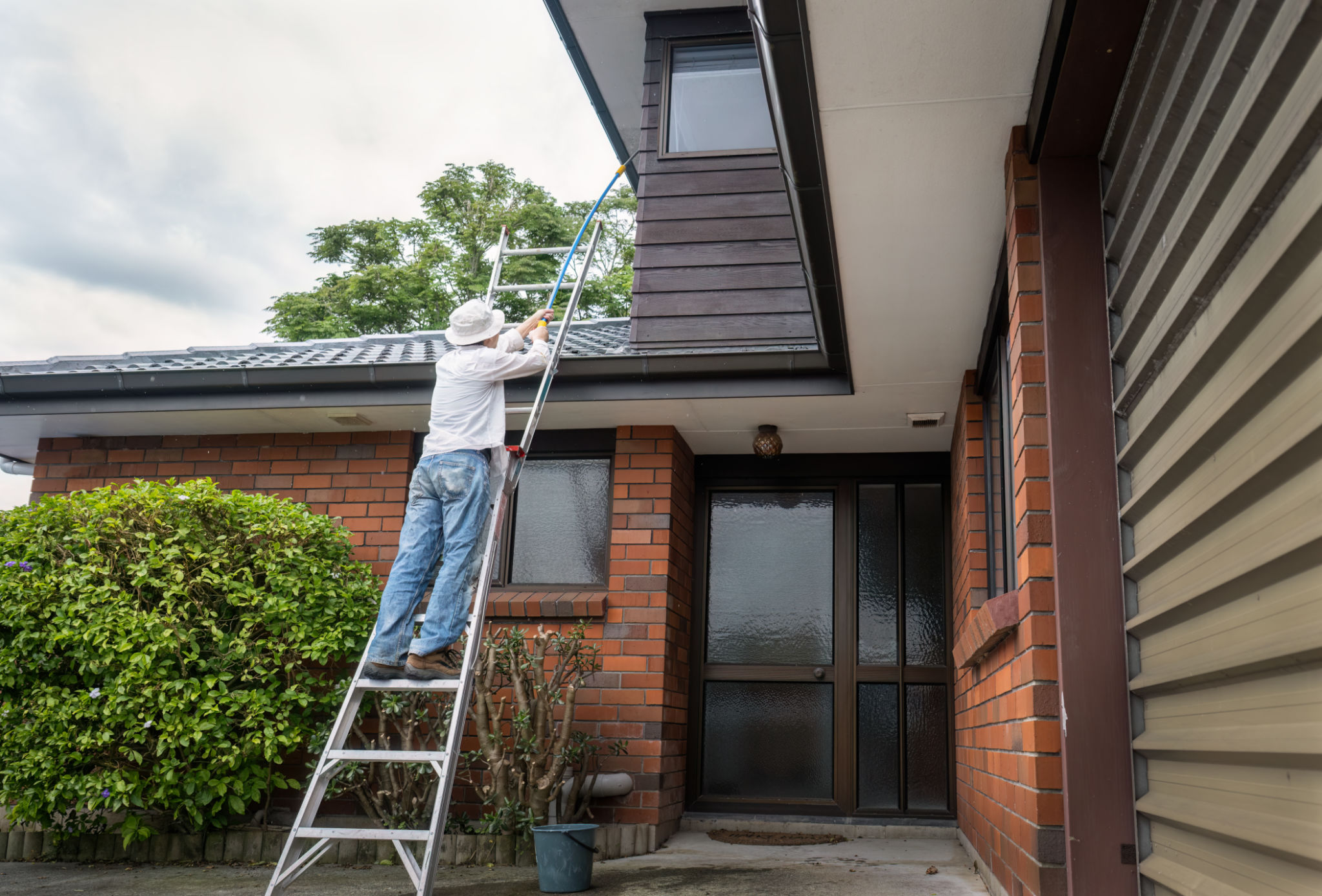 pressure washing house