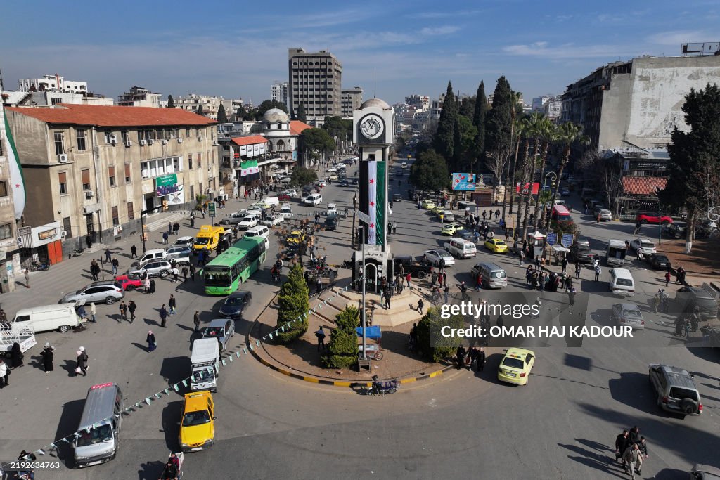 Syrian Clock This aerial view shows traffic around the New Clock Tower along... News ...