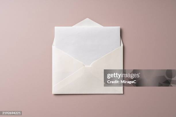 opened white envelope with blank letter inside - kuvert bildbanksfoton och bilder