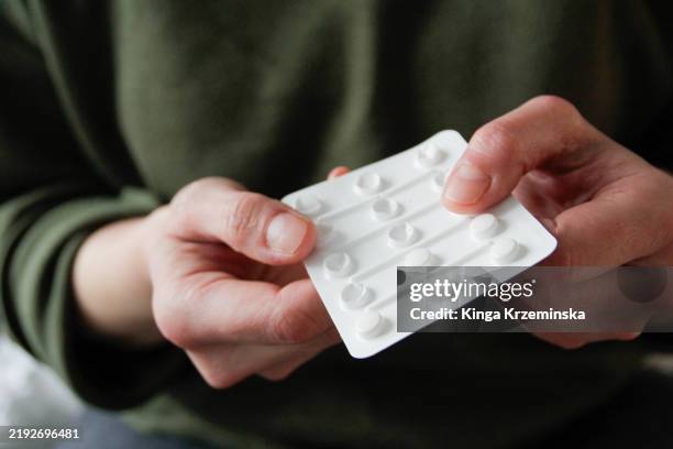 taking pill - plan b stock pictures, royalty-free photos & images